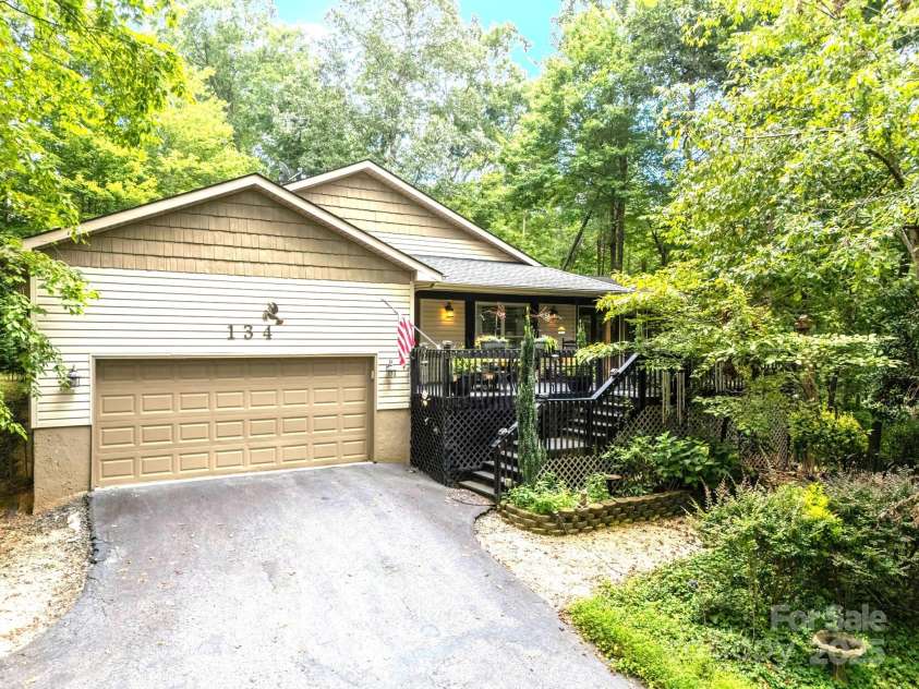 134 Downing Place, Lake Lure, NC 28746.  MLS# CAR4289968, YatesRealty ID 32258. Inviting outdoor living area with seasonal views of mtns. & golf course
