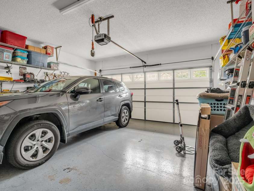 27 Gray Wolf Lane, Hendersonville, NC 28792.  MLS# CAR4285060, YatesRealty ID 32261. Garage w/Epoxy Flooring