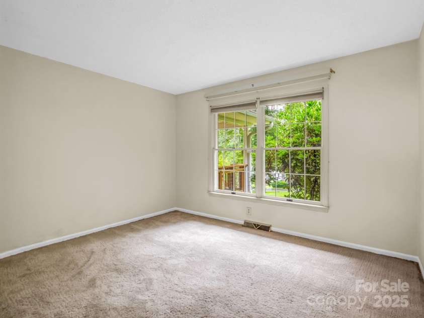 612 Buckeye Cove Road, Swannanoa, NC 28778.  MLS# CAR4287108, YatesRealty ID 32265. Guest front bedroom.