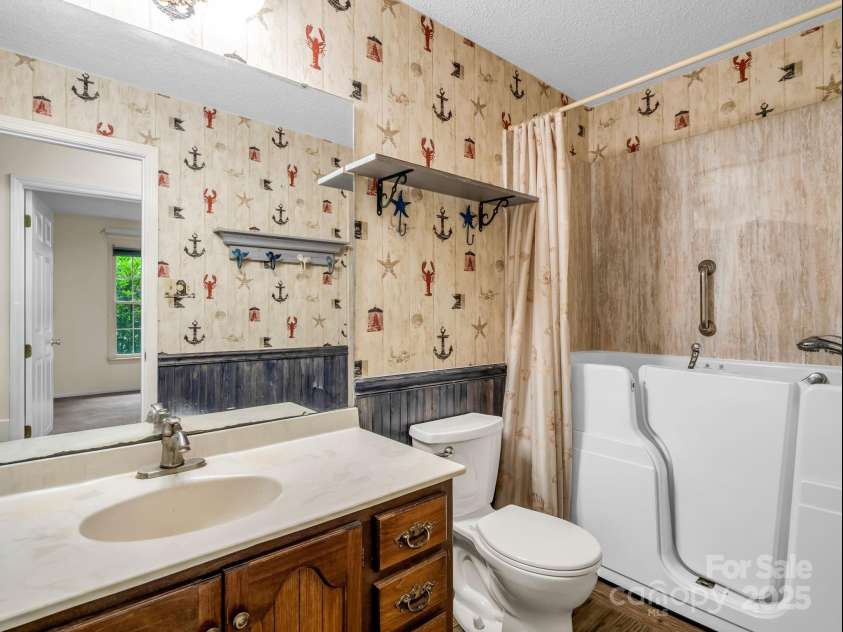 612 Buckeye Cove Road, Swannanoa, NC 28778.  MLS# CAR4287108, YatesRealty ID 32265. Guest hall bath.