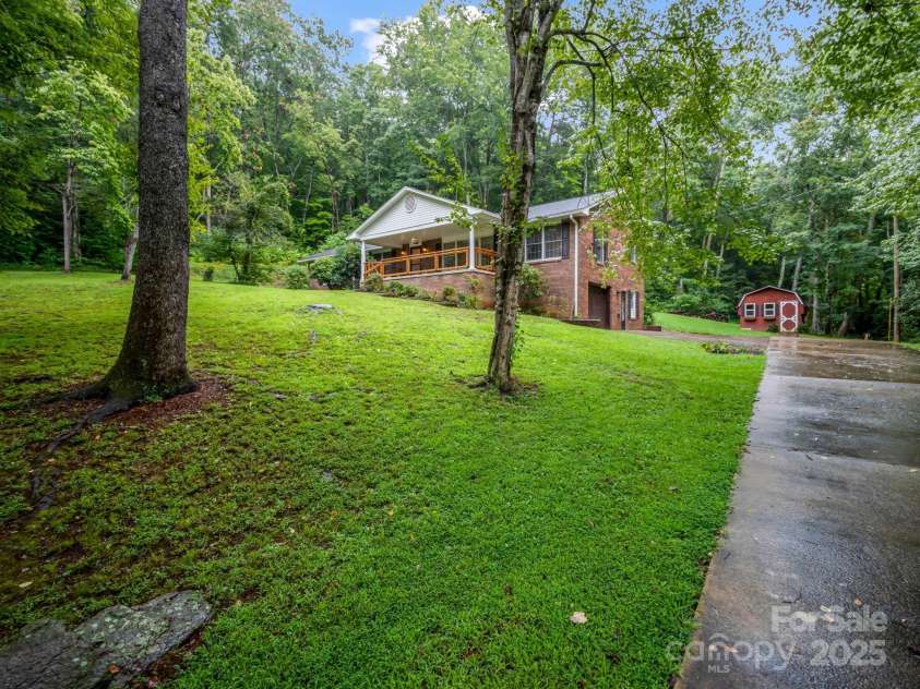 612 Buckeye Cove Road, Swannanoa, NC 28778.  MLS# CAR4287108, YatesRealty ID 32265. Lovely brick home located in scenic Buckeye Cove, just 10 minutes to Asheville.