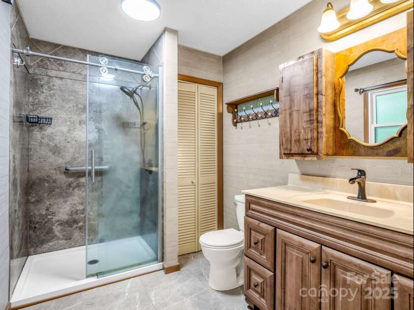 612 Buckeye Cove Road, Swannanoa, NC 28778.  MLS# CAR4287108, YatesRealty ID 32265. Primary bath.