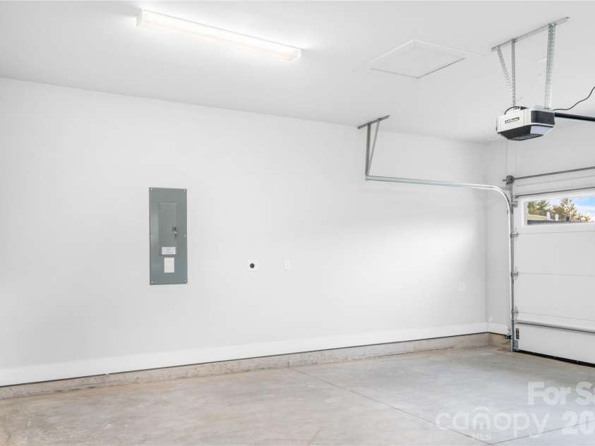 114 Chapel Crossing Lane, Weaverville, NC 28787.  MLS# CAR4337352, YatesRealty ID 32269. Garage is now epoxied