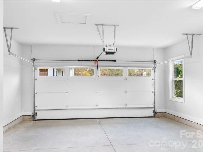 114 Chapel Crossing Lane, Weaverville, NC 28787.  MLS# CAR4337352, YatesRealty ID 32269. Garage is now epoxied