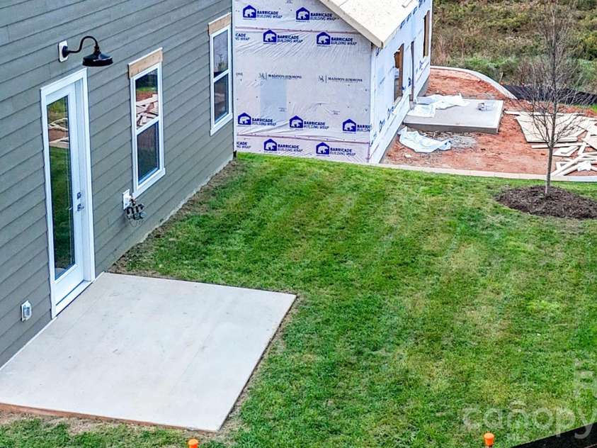 114 Chapel Crossing Lane, Weaverville, NC 28787.  MLS# CAR4337352, YatesRealty ID 32269. Privacy fencing and trees have now been added