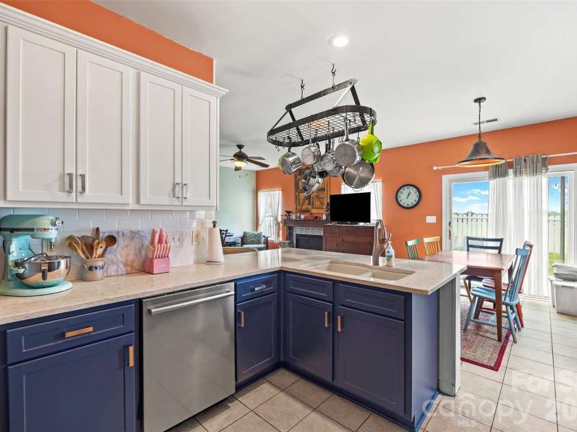 3310 Burnage Hall Road, Harrisburg, NC 28075.  MLS# CAR4387122, YatesRealty ID 32269. Kitchen looking into Breakfast Area