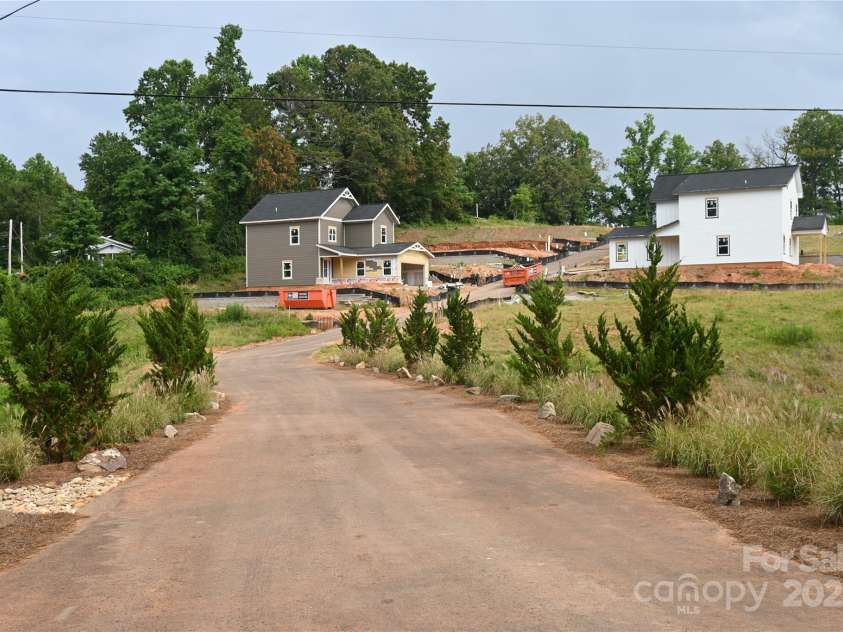 116 Chapel Crossing Lane, Weaverville, NC 28787.  MLS# CAR4254369, YatesRealty ID 32270. Community Entrance