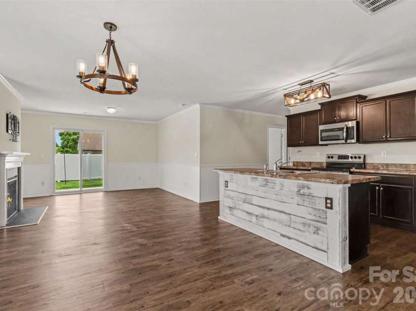 2801 Thomas Twig Drive, Dallas, NC 28034.  MLS# CAR4383301, YatesRealty ID 32270. Great Room/ Dining Area