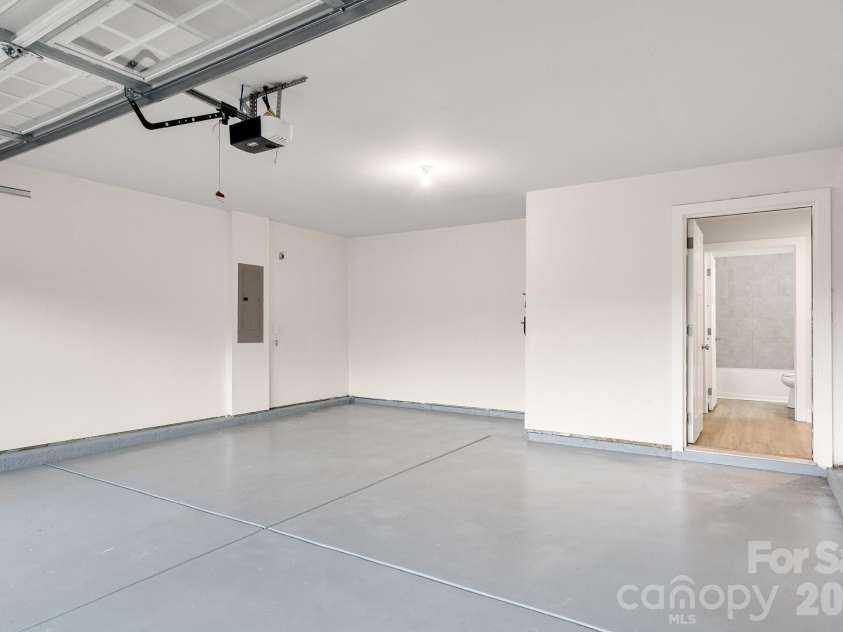 4238 Mackinnon Drive, Charlotte, NC 28214.  MLS# CAR4383715, YatesRealty ID 32272. Finished Garage