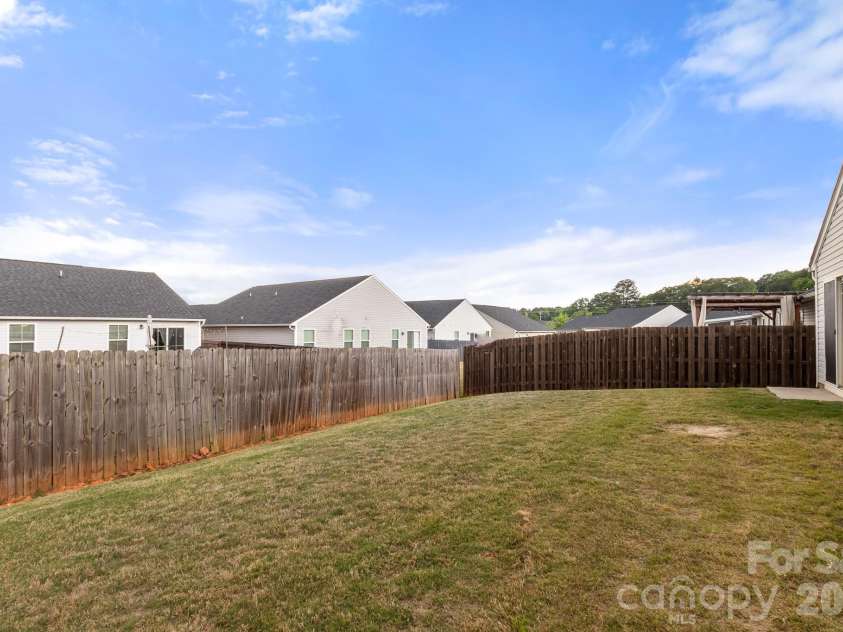 4238 Mackinnon Drive, Charlotte, NC 28214.  MLS# CAR4383715, YatesRealty ID 32272. Privacy Fenced backyard
