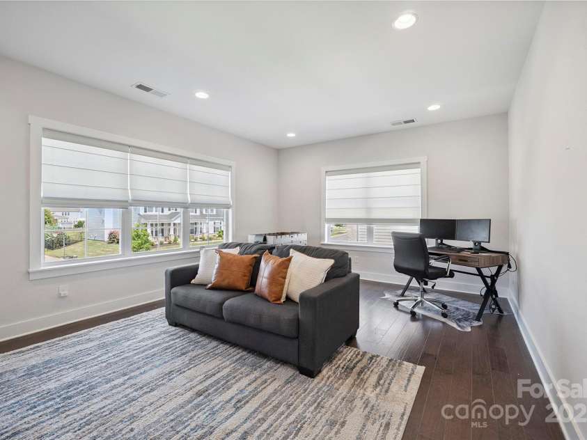 19012 Beecher Commons Drive, Huntersville, NC 28078.  MLS# CAR4276383, YatesRealty ID 32273. Bonus Room features recessed lighting & plenty of natural light flowing through!