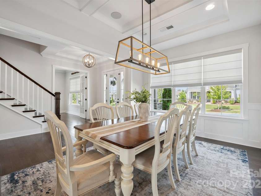 19012 Beecher Commons Drive, Huntersville, NC 28078.  MLS# CAR4276383, YatesRealty ID 32273. Formal Dining Room features beautiful millwork, plenty of natural light & designer light fixture!