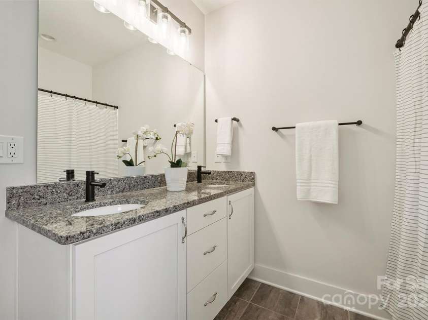 19012 Beecher Commons Drive, Huntersville, NC 28078.  MLS# CAR4276383, YatesRealty ID 32273. Full Bath on upper level with dual, granite vanity, tub/shower & tile floors!