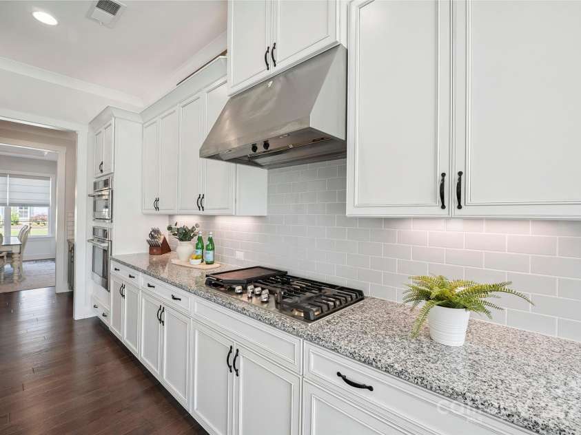 19012 Beecher Commons Drive, Huntersville, NC 28078.  MLS# CAR4276383, YatesRealty ID 32273. Gas cook top with hood system!