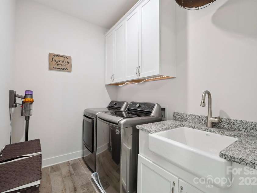19012 Beecher Commons Drive, Huntersville, NC 28078.  MLS# CAR4276383, YatesRealty ID 32273. Laundry Room on upper level with sink & cabinets for storage!