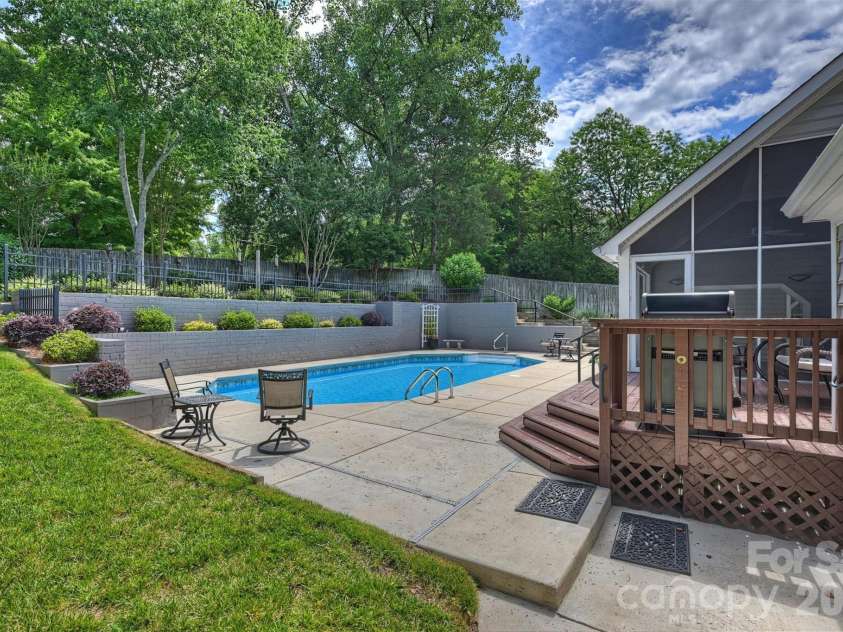 4013 Bridgewood Lane, Charlotte, NC 28226.  MLS# CAR4372184, YatesRealty ID 32276. Backyard is so well done