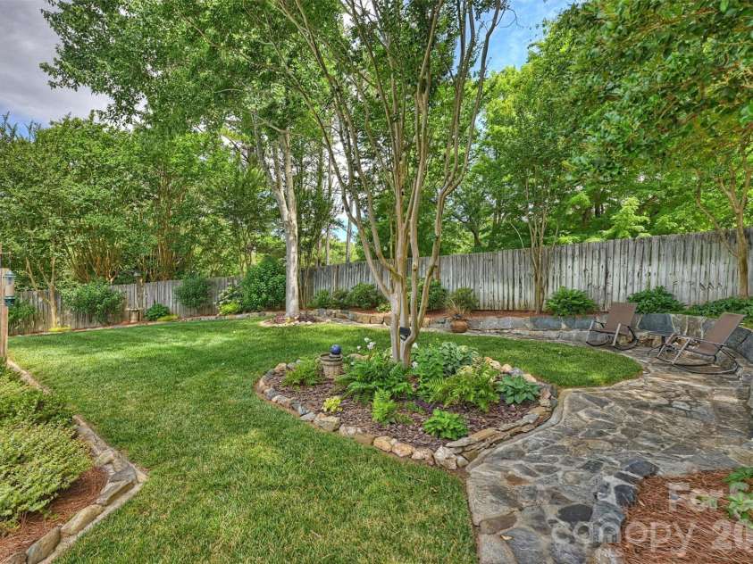 4013 Bridgewood Lane, Charlotte, NC 28226.  MLS# CAR4372184, YatesRealty ID 32276. Paved seating area to look down at the pool