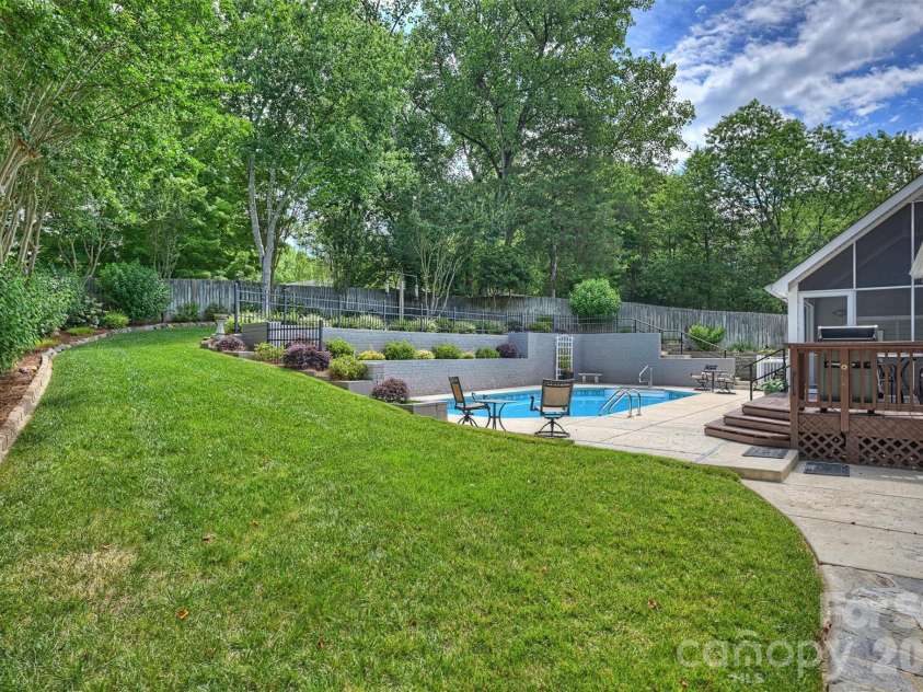 4013 Bridgewood Lane, Charlotte, NC 28226.  MLS# CAR4372184, YatesRealty ID 32276. Terraced back yard