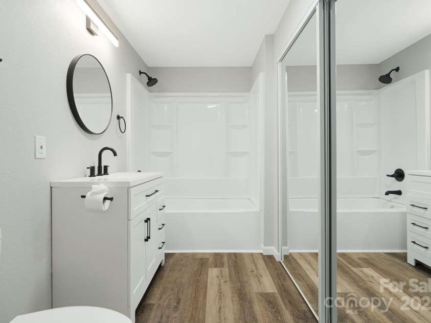 95 Grassy View Road, Candler, NC 28715.  MLS# CAR4283278, YatesRealty ID 32276. Bathroom #2 downstairs