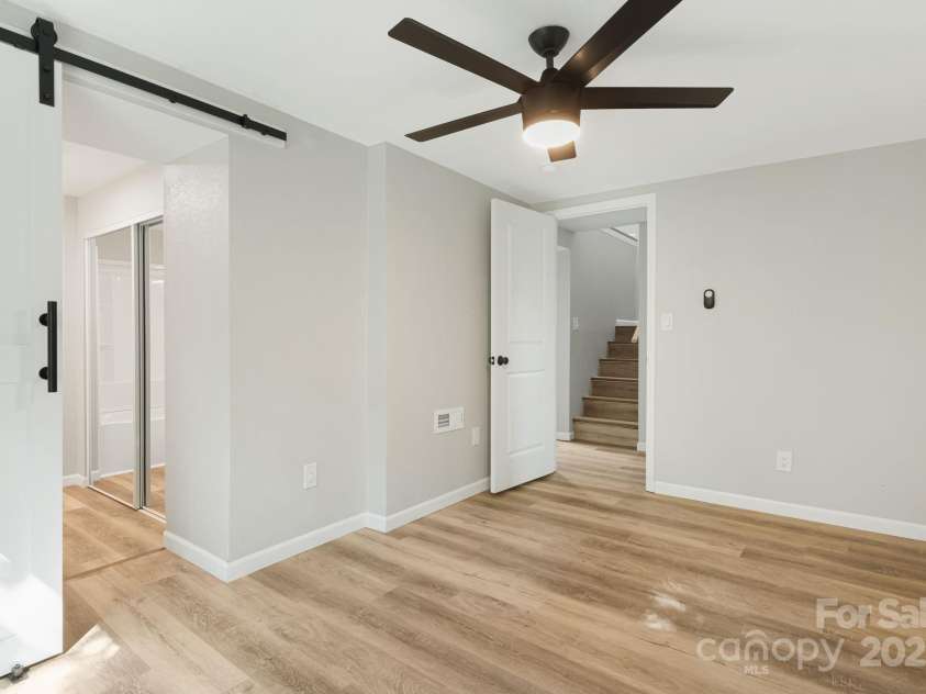 95 Grassy View Road, Candler, NC 28715.  MLS# CAR4283278, YatesRealty ID 32276. Bedroom #2 located downstairs