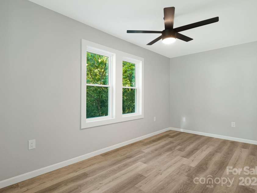 95 Grassy View Road, Candler, NC 28715.  MLS# CAR4283278, YatesRealty ID 32276. Dining room!