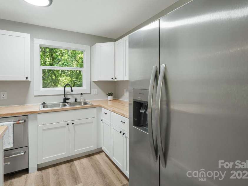 95 Grassy View Road, Candler, NC 28715.  MLS# CAR4283278, YatesRealty ID 32276. New kitchen cabinets with butcherblock countertops!