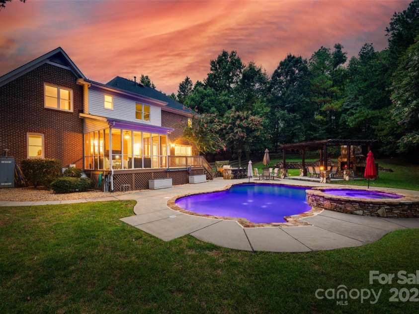1311 Big Rock Court, Fort Mill, SC 29708.  MLS# CAR4289290, YatesRealty ID 32278. Twilight Back Yard