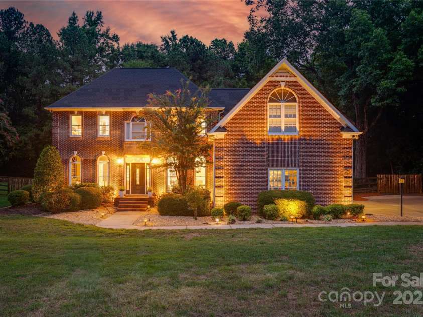 1311 Big Rock Court, Fort Mill, SC 29708.  MLS# CAR4289290, YatesRealty ID 32278. Twilight Front