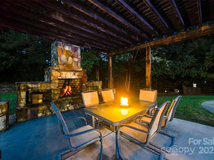 1311 Big Rock Court, Fort Mill, SC 29708.  MLS# CAR4289290, YatesRealty ID 32278. Twilight Outdoor Fireplace
