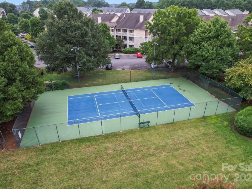 18709 Nautical Drive, Cornelius, NC 28031.  MLS# CAR4290511, YatesRealty ID 32279. Community tennis court