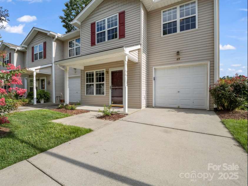 69 Wiltshire Circle, Fletcher, NC 28732.  MLS# CAR4290881, YatesRealty ID 32281. Enjoy thew covered front porch in this quiet community.
