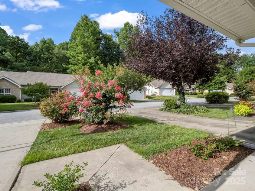 69 Wiltshire Circle, Fletcher, NC 28732.  MLS# CAR4290881, YatesRealty ID 32281. Sweet view from the covered front porch.