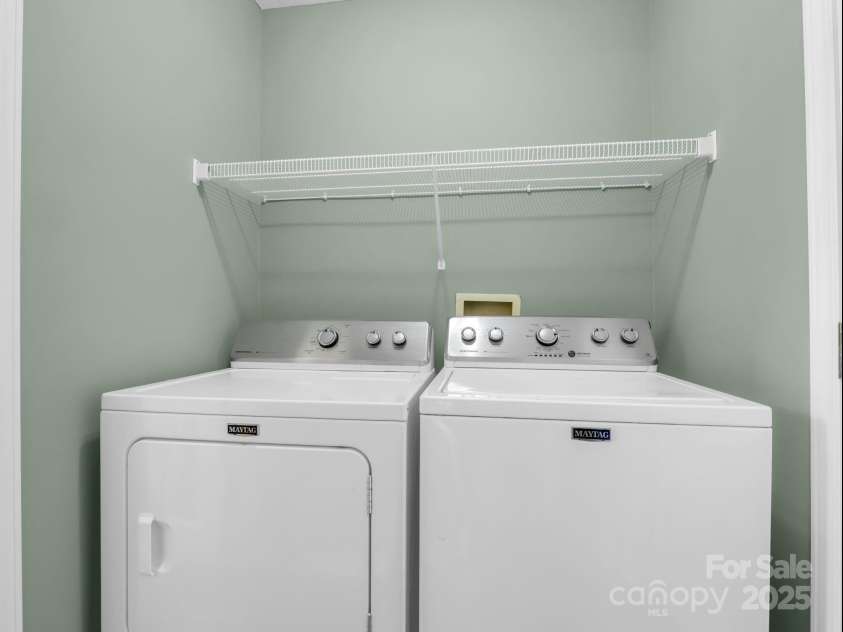 69 Wiltshire Circle, Fletcher, NC 28732.  MLS# CAR4290881, YatesRealty ID 32281. The laundry room comes equipped with this washer and dryer.
