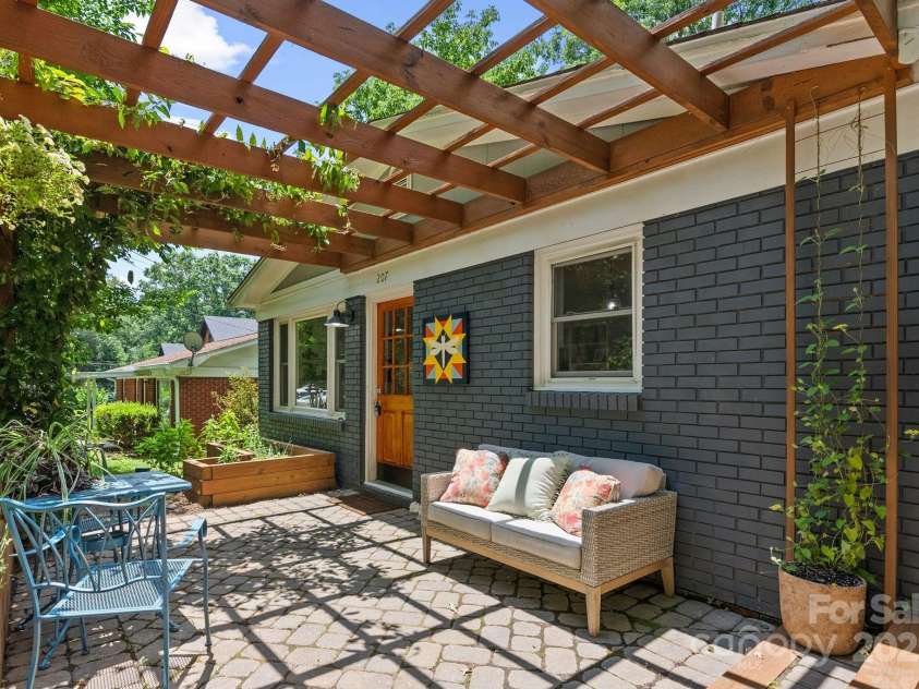 207 Oconeechee Avenue, Black Mountain, NC 28711.  MLS# CAR4290585, YatesRealty ID 32284. Arbor Covered Patio Welcomes You