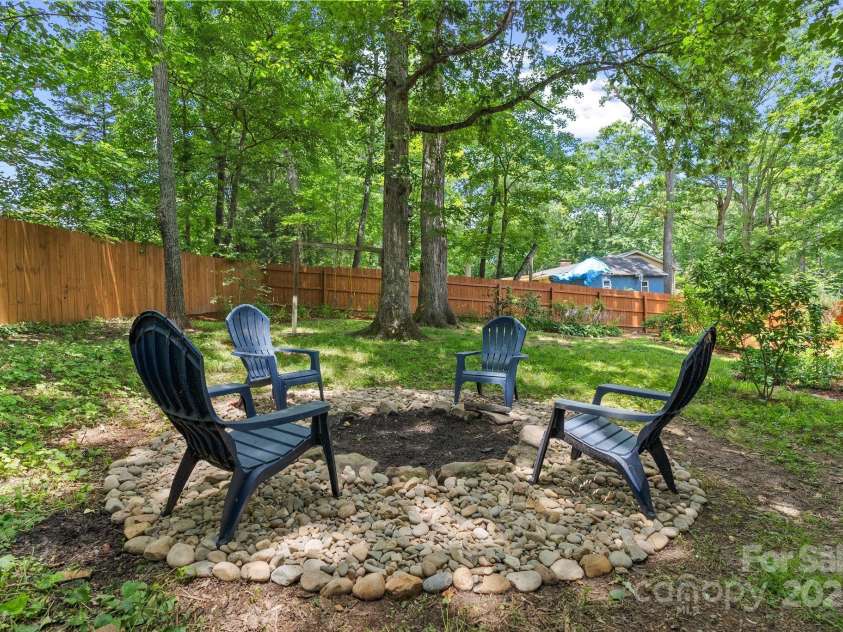 207 Oconeechee Avenue, Black Mountain, NC 28711.  MLS# CAR4290585, YatesRealty ID 32284. Enjoy Evenings by the Fire