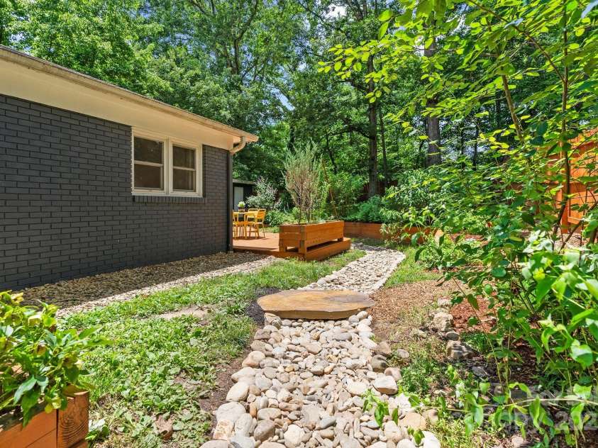 207 Oconeechee Avenue, Black Mountain, NC 28711.  MLS# CAR4290585, YatesRealty ID 32284. Incredible Stonework * Dry River Rock Creek Bed