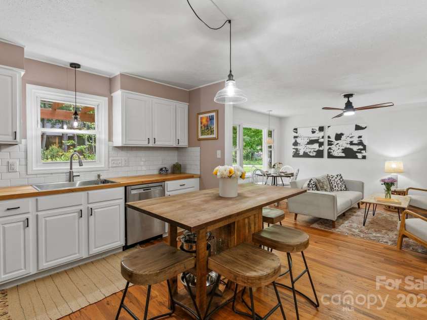 207 Oconeechee Avenue, Black Mountain, NC 28711.  MLS# CAR4290585, YatesRealty ID 32284. Kitchen Opens to Living and Dining