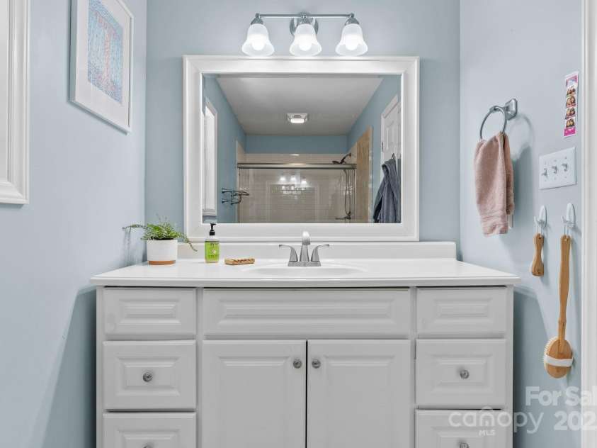 207 Oconeechee Avenue, Black Mountain, NC 28711.  MLS# CAR4290585, YatesRealty ID 32284. Large Vanity with Storage