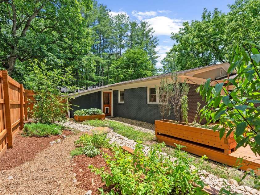 207 Oconeechee Avenue, Black Mountain, NC 28711.  MLS# CAR4290585, YatesRealty ID 32284. Mulch Path to Stone Bridge to Mudroom Door