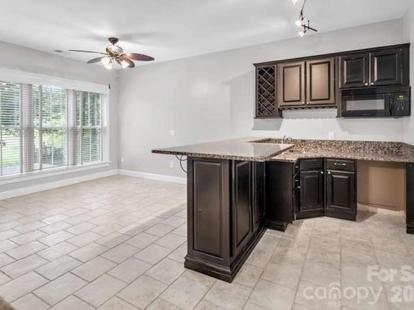 619 Oak Drive, Huntersville, NC 28078.  MLS# CAR4371399, YatesRealty ID 32284. Basement Kitchenette