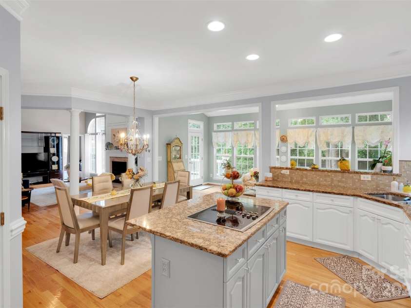 10837 Wilklee Drive, Charlotte, NC 28277.  MLS# CAR4291403, YatesRealty ID 32289. Kitchen area - tons of storage and counterspace. Opens to sunroom which allows for so much natural light to flow through the home