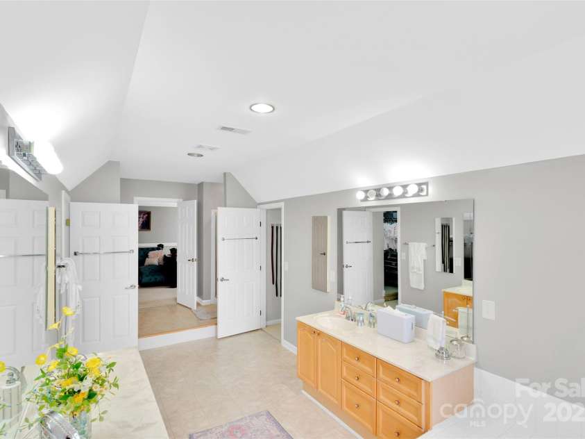 10837 Wilklee Drive, Charlotte, NC 28277.  MLS# CAR4291403, YatesRealty ID 32289. Primary bathroom with dual sinks and dual closets