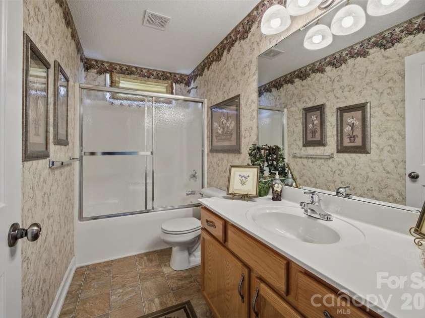 109 Morgan Trace Drive, Valdese, NC 28690.  MLS# CAR4350073, YatesRealty ID 3229. Guest Bathroom