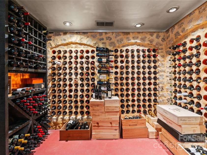 4231 Fox Brook Lane, Charlotte, NC 28211.  MLS# CAR4186375, YatesRealty ID 3229. The temp controlled wine cellar is ready for a new collection.Plenty of space for planning your next wine dinner. Sub zero Wine chiller in the kitchen.