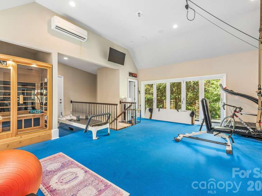 4231 Fox Brook Lane, Charlotte, NC 28211.  MLS# CAR4335388, YatesRealty ID 3229. Home gym that is second to none. From the padded floor, to the floor to ceiling mirrors, a dry sauna plus a half bath.