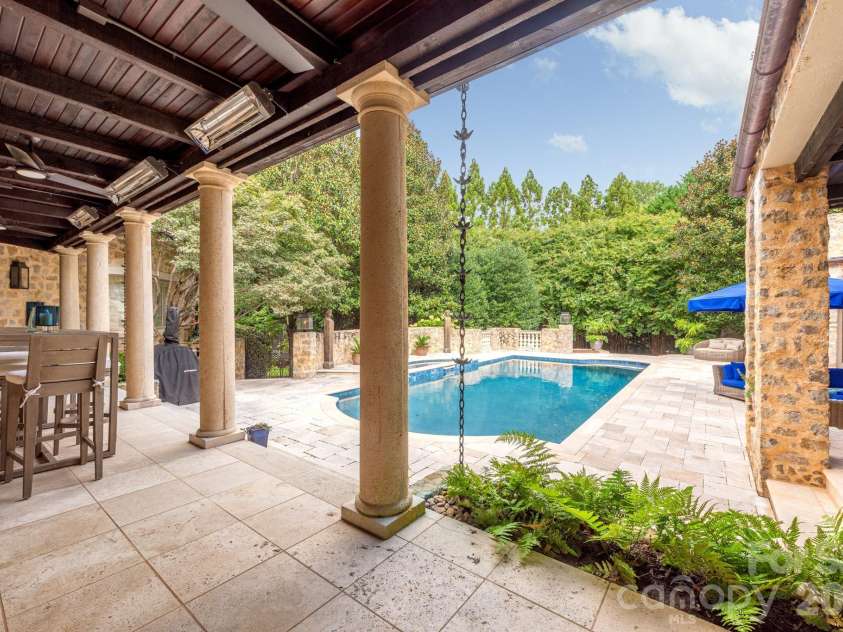 4231 Fox Brook Lane, Charlotte, NC 28211.  MLS# CAR4335388, YatesRealty ID 3229. Imagine a cool autumn breeze as you dine alfresco on your heated covered patio. 