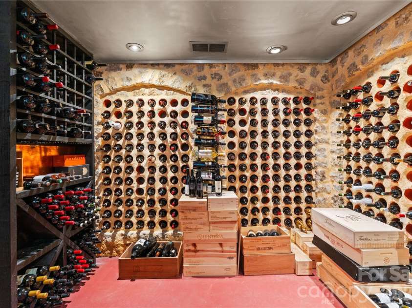 4231 Fox Brook Lane, Charlotte, NC 28211.  MLS# CAR4335388, YatesRealty ID 3229. The temp controlled wine cellar is ready for a new collection.Plenty of space for planning your next wine dinner. Sub zero Wine chiller in the kitchen.