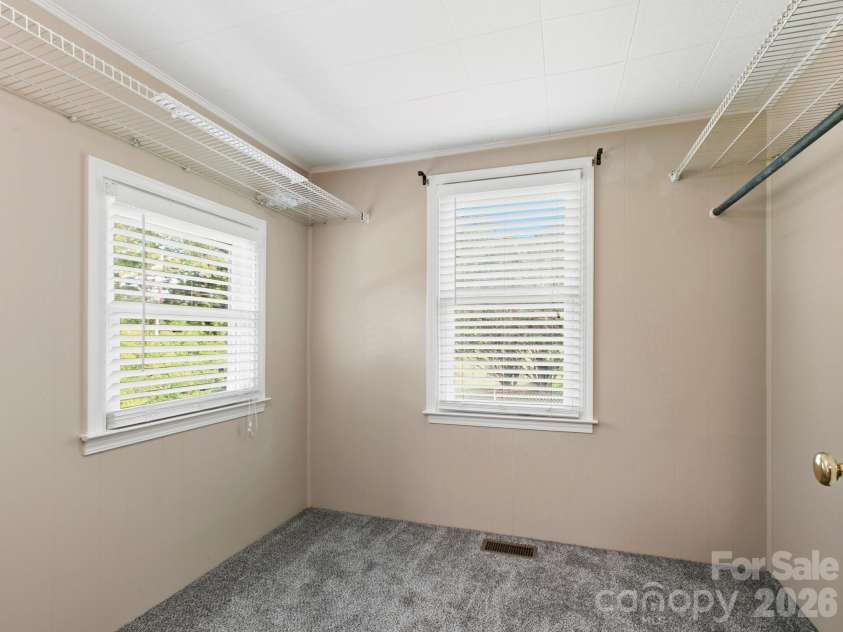 407 Hall Street, Hendersonville, NC 28739.  MLS# CAR4393602, YatesRealty ID 32291. Primary closet.