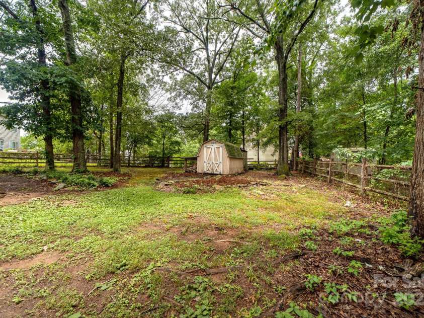 5408 Apple Glen Drive, Harrisburg, NC 28075.  MLS# CAR4273916, YatesRealty ID 32295. Fenced Back yard