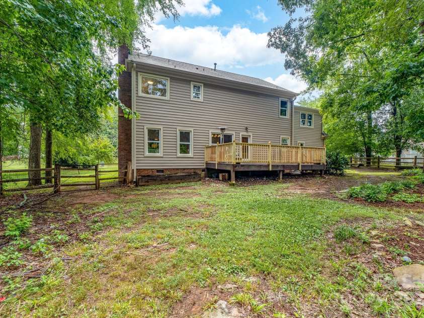 5408 Apple Glen Drive, Harrisburg, NC 28075.  MLS# CAR4273916, YatesRealty ID 32295. Fenced Back yard